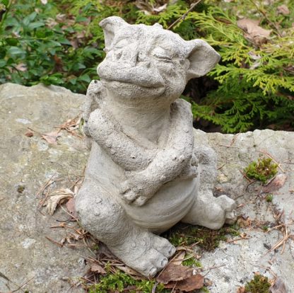 Drache Rowly hält sich den Bauch